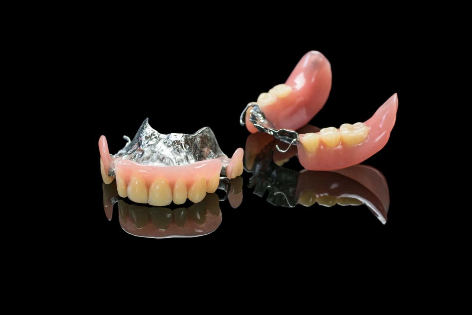 partial dentures set on isolated background